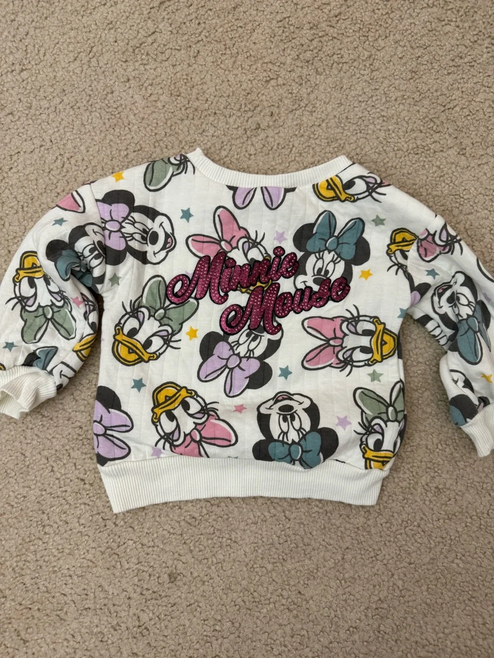 Kids White Daisy Duck Print Sweatshirt with Pink 'M' Patch